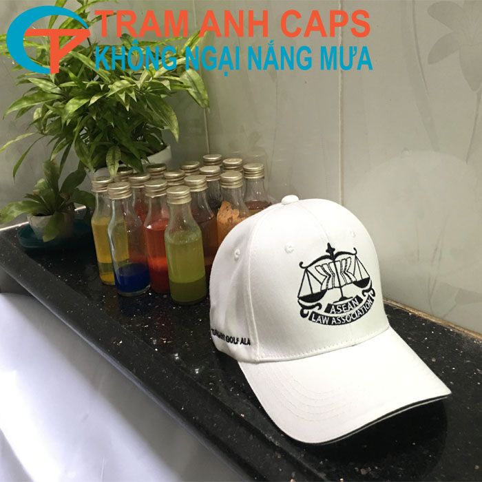 Precision golf tournament cap with custom side sponsor embroidery